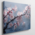 Framed canvas print of cherry blossoms with rain droplets on blue background