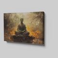 Framed canvas print of a meditative Buddha in a serene forest setting with warm, fiery orange hues