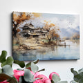 Canvas art of a tranquil oriental landscape with autumnal trees, traditional architecture, calm water, and mountains in the background.