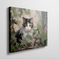 Framed canvas print of impressionist painting featuring a cat with roses and green leaves