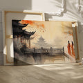 Framed canvas print of traditional Chinese ink wash painting with figures in orange robes and pagodas