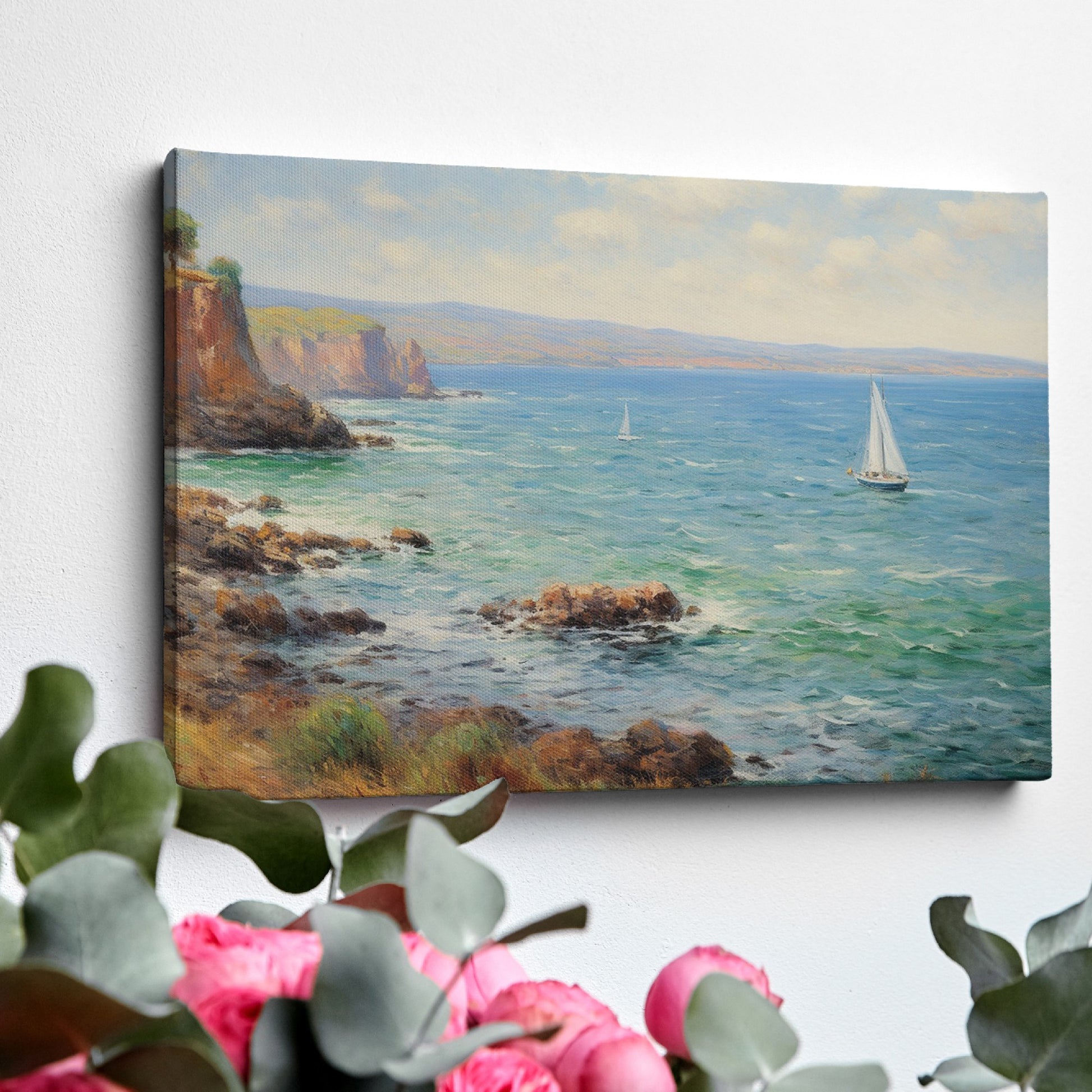 Framed canvas print of an impressionist painting depicting sailing boats on a serene sea beside a coastal cliff