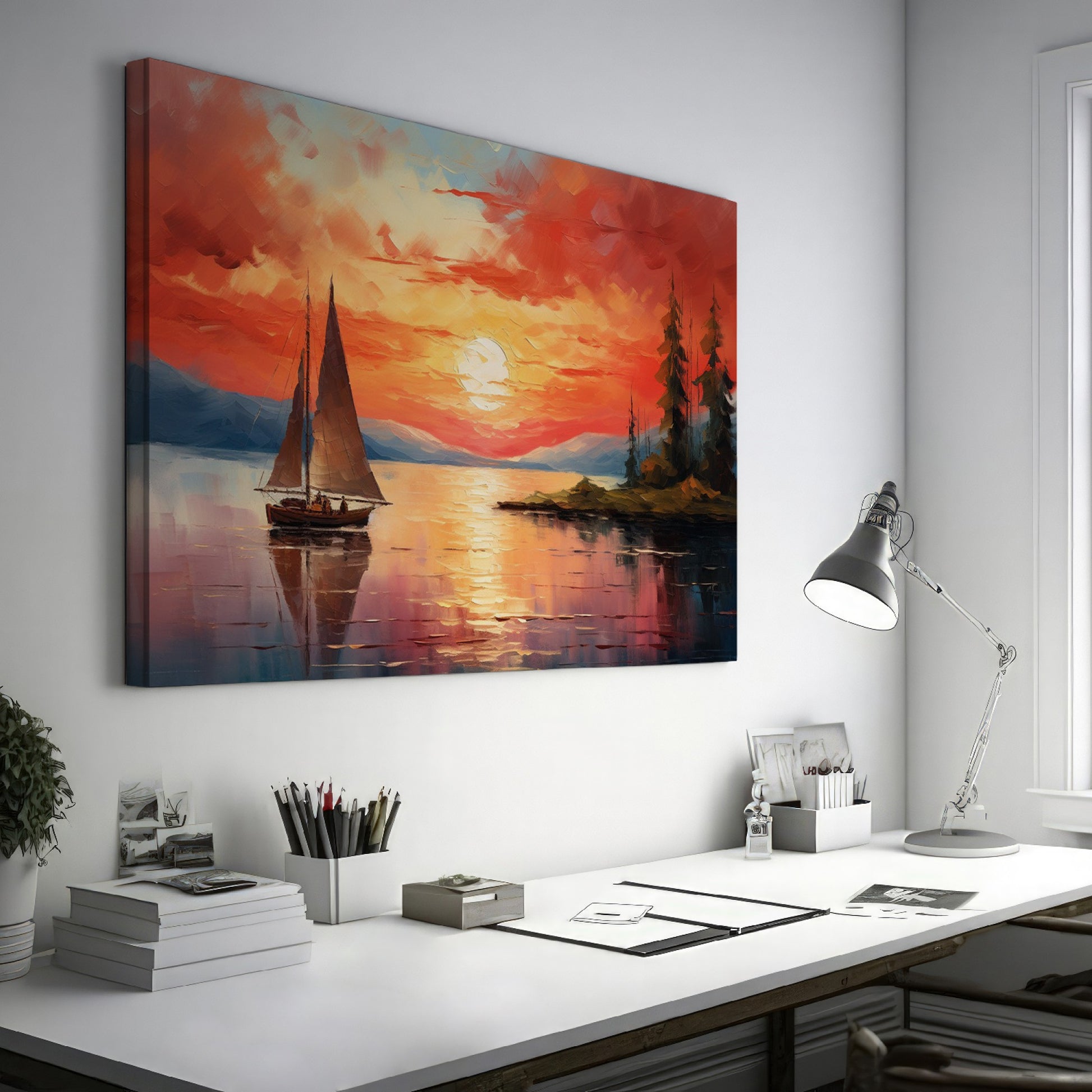 Framed canvas print of a sailboat sailing at sunset with vibrant sky and reflective water