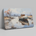 Framed canvas print of a tranquil landscape with a vintage boat moored on calm waters, reflecting autumnal trees