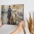 Framed canvas print of a Victorian couple and their dog walking on a rainy Paris street