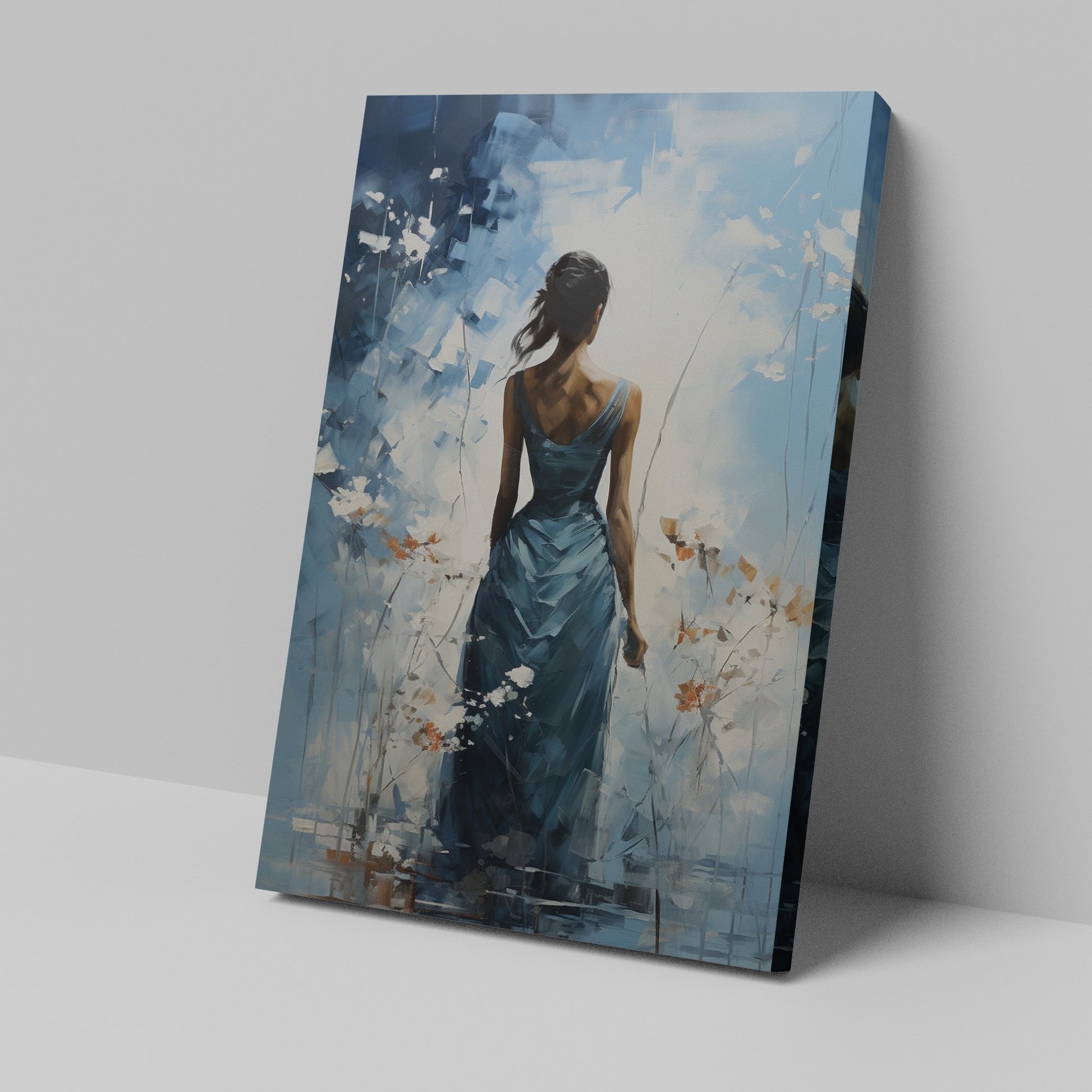 Framed canvas print of an abstract painting depicting a woman in a blue dress with a tranquil, flowy design against a blue and white background