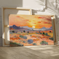 Framed canvas print of an impressionist painting depicting a desert sunset with warm colours