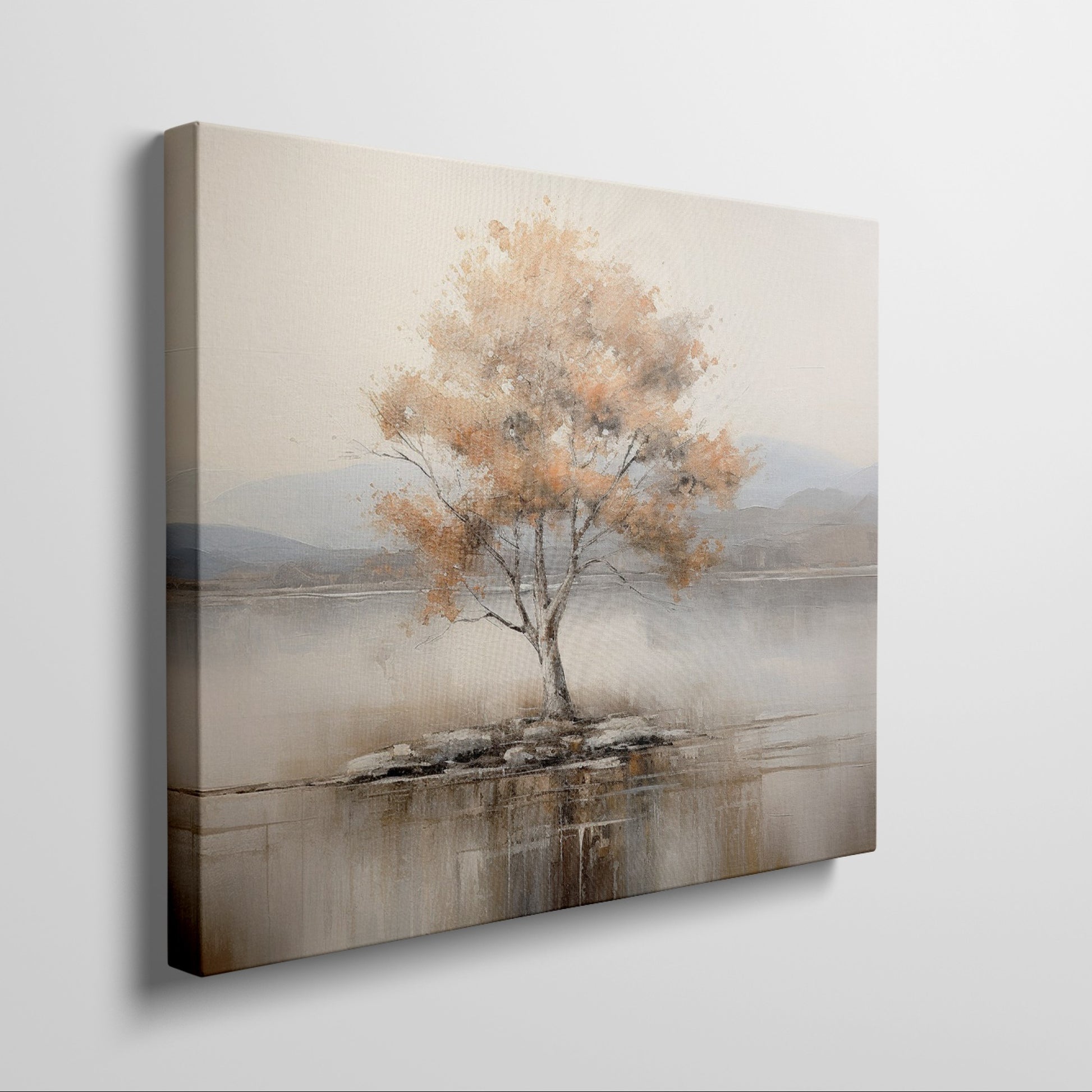 Framed canvas print of a solitary tree with autumn leaves reflected on a calm lake with warm beige, gold, and white tones