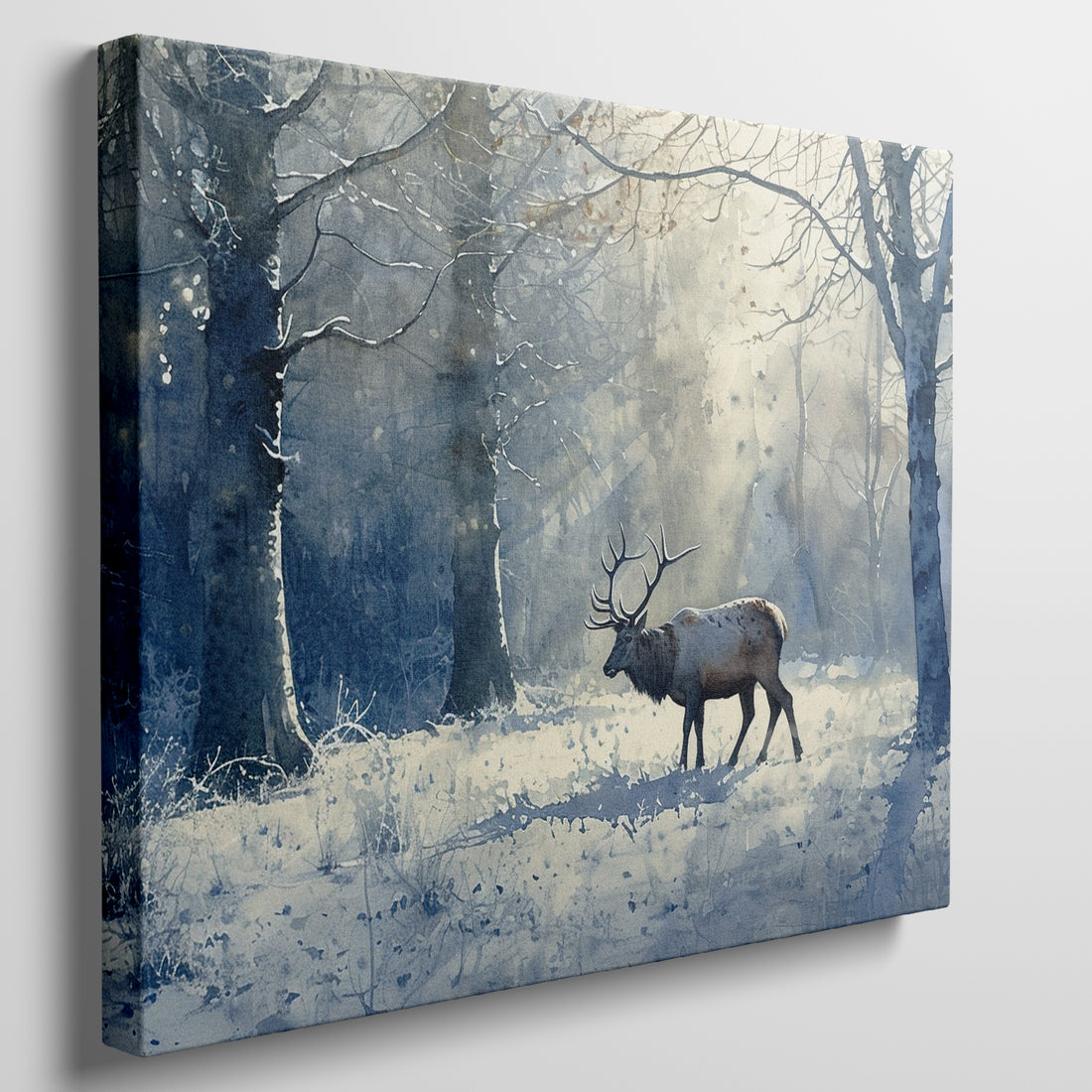 Framed canvas print of a stag in a snow-covered forest with a watercolour blue and white palette