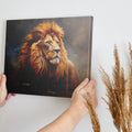 Framed canvas print of a majestic lion portrait, with detailed mane and warm earthy colours