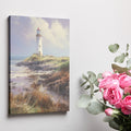 Framed canvas print of a tranquil coastal scene with a lighthouse on a sunny day