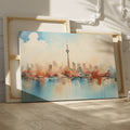 Framed canvas print of a soothing abstract cityscape with watercolour skyline and reflections