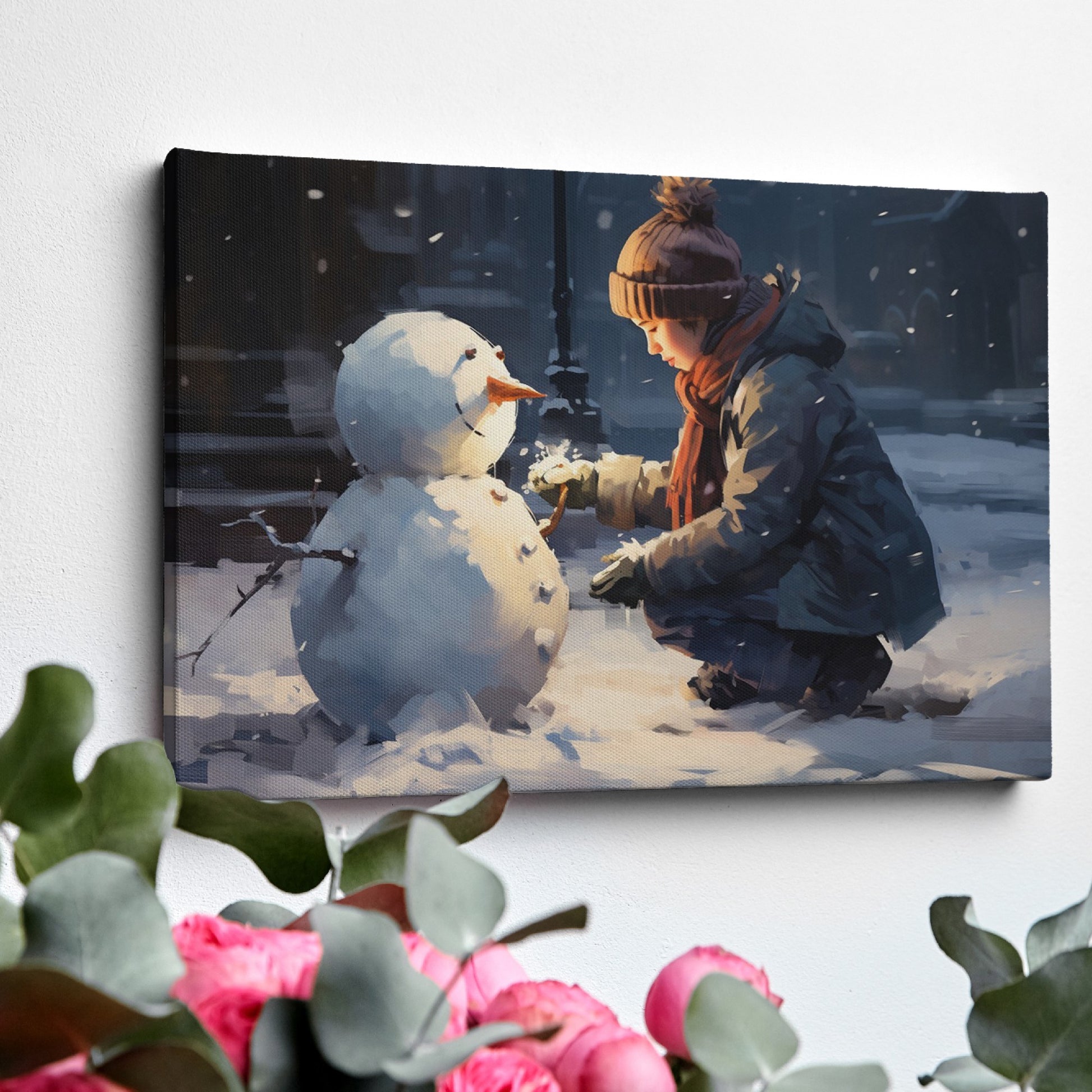 Framed canvas print of a child building a snowman on a snowy city evening