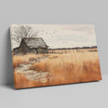 Framed canvas print of a rustic barn in autumn with golden fields and a stone pathway