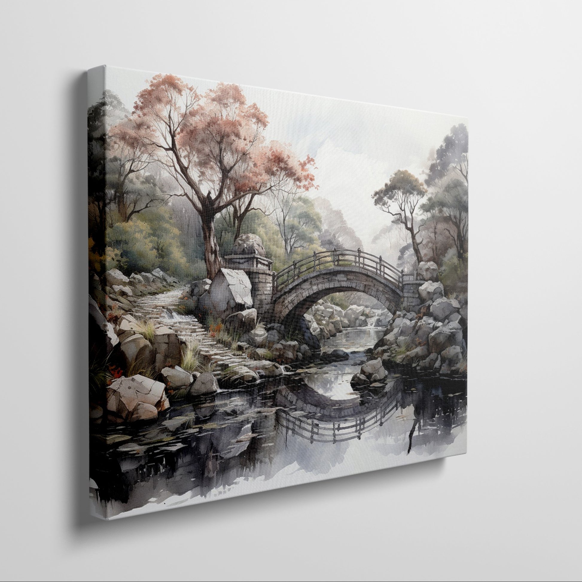 Framed canvas print of an autumnal stone bridge over a serene stream, surrounded by trees with watercolour details