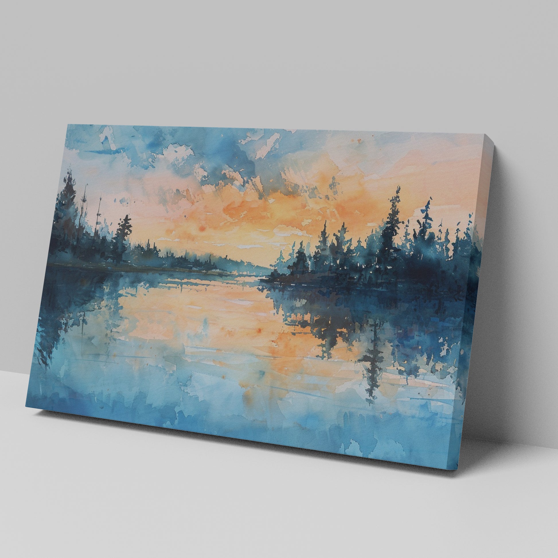 Framed canvas print of a watercolour painting with sunset over a lake and forest silhouette