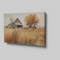 Framed canvas print of a rustic barn in autumn with golden fields and a leafy tree