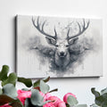 Framed canvas print of a mystical monochrome stag with abstract ink splash design