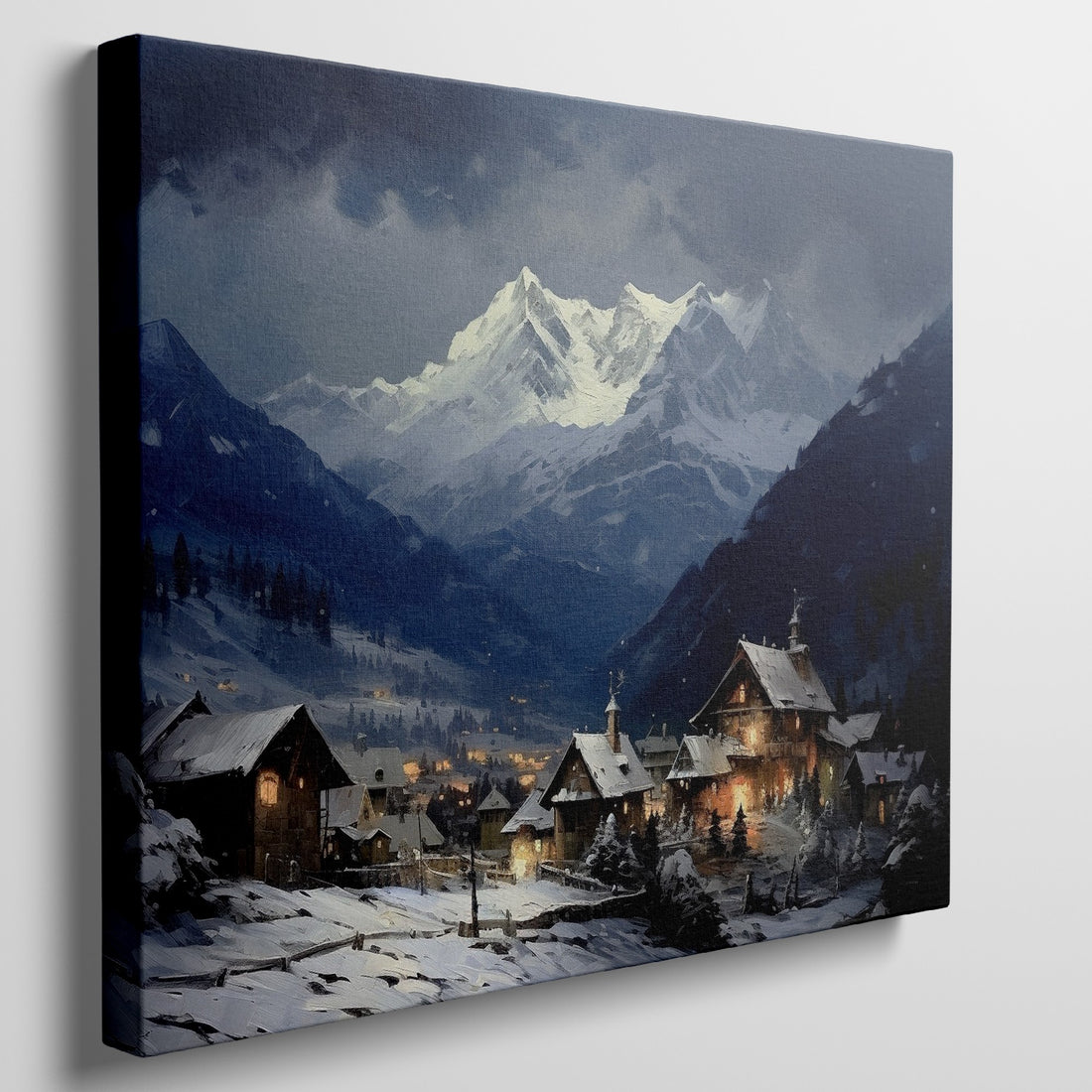 Framed canvas print of a snowy Alpine village with mountain backdrop and evening glow