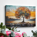 Textured canvas art of a tree with autumn leaves and a serene sunset in the background