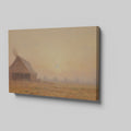 Framed canvas print of golden sunrise with a thatched cottage in a tranquil countryside scene