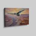 Framed canvas print of a majestic eagle flying over a dramatic canyon landscape at sunset