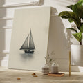 Framed canvas print of a vintage sailboat on a calm sea in monochrome