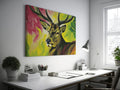 Framed canvas print of a vibrant stag painting with a multicoloured background