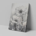 Framed canvas print of monochrome flowers with water droplets