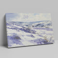 Framed canvas print of a serene winter landscape with snow-covered hills and valleys