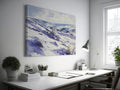 Framed canvas print of a serene winter landscape with snow-covered hills and valleys