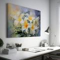 Framed canvas print of impressionist style lilies in vibrant cream and yellow hues