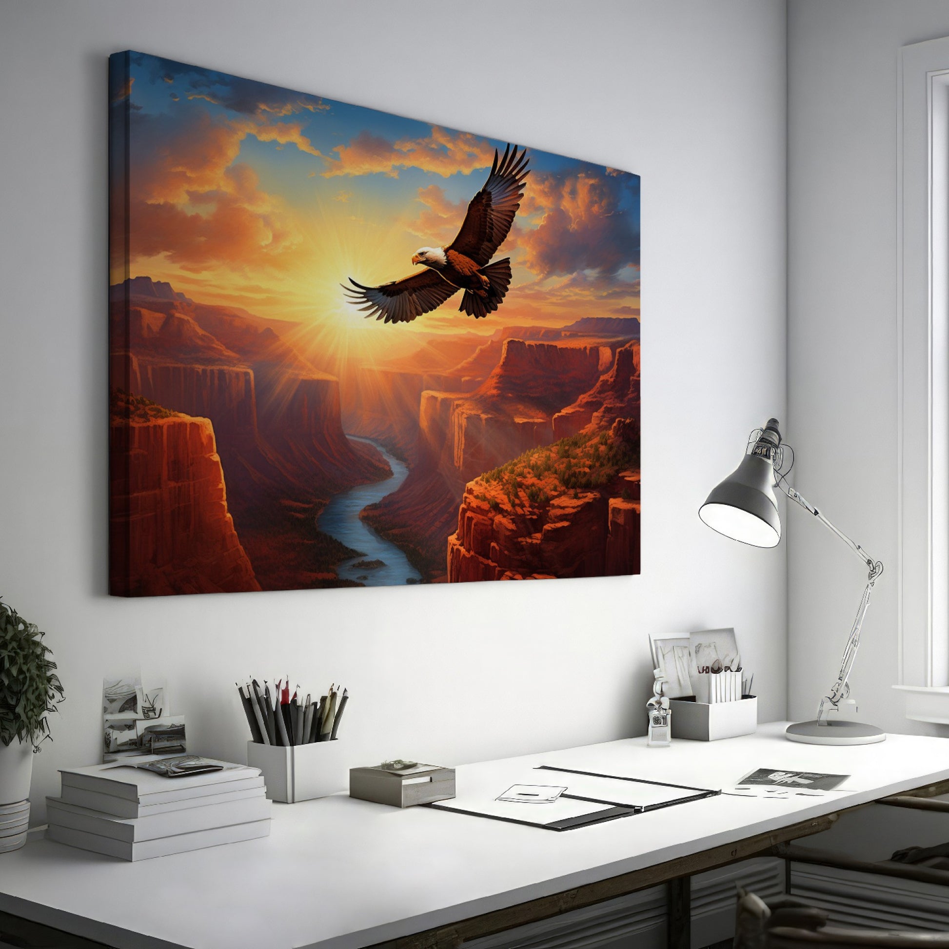 Framed canvas print of a majestic eagle flying over a sunset-lit river canyon