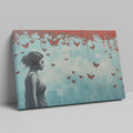 Framed canvas print of a female silhouette with red butterflies against an urban backdrop