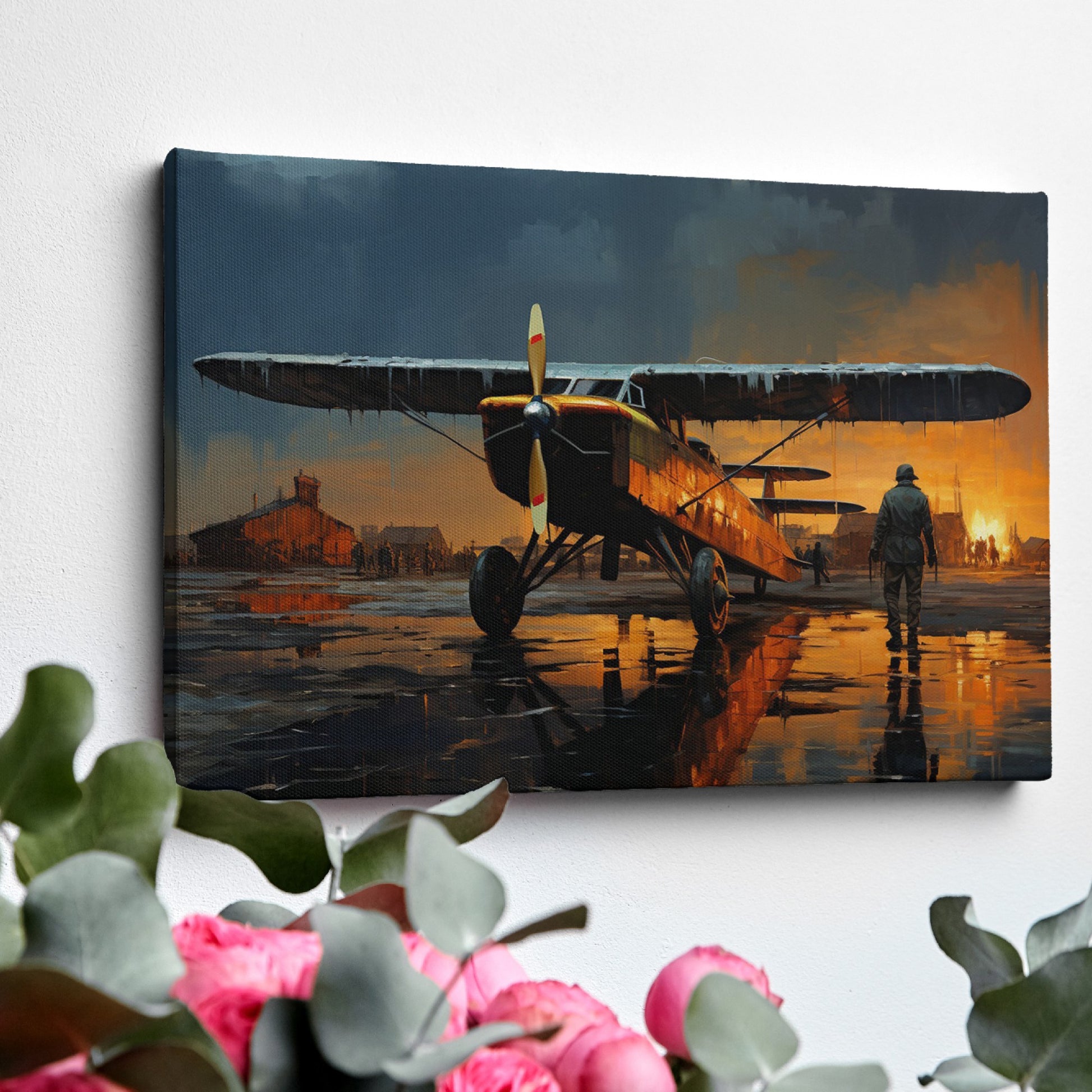 Framed canvas print of a vintage biplane on wet airfield at sunset with pilot walking