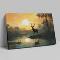 Framed canvas print of a majestic stag against a forest lake at sunrise with orange skies