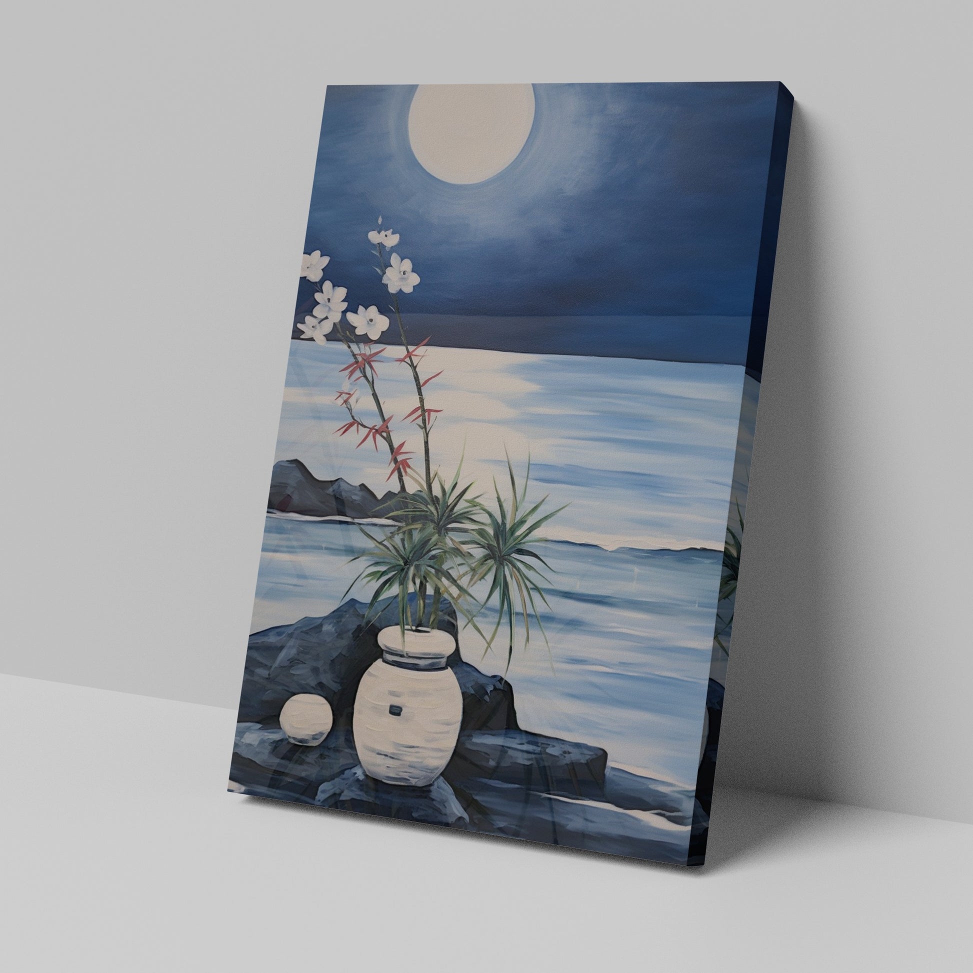 Blue and white moonlit seascape painting with flowers, rocks, and water