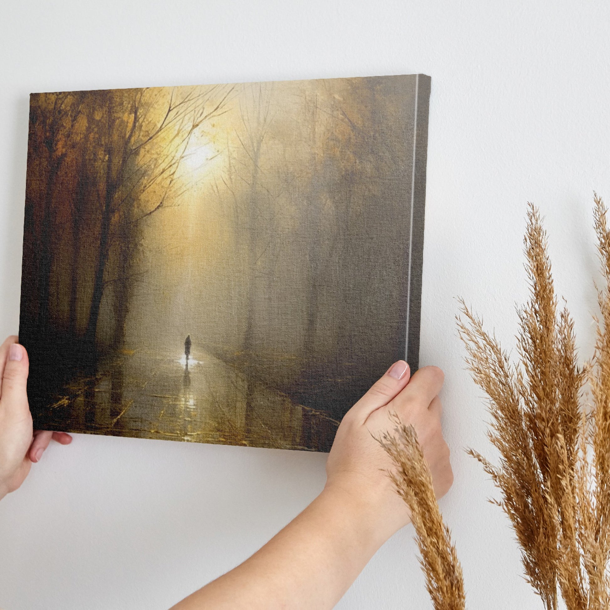 Framed canvas print of a mystical autumn forest with a lone wanderer on a sunlit path