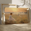 Framed canvas print of a woman in a white dress gazing at a misty sunrise over a golden field