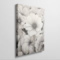 Framed canvas print of monochromatic flowers with intricate designs and neutral tones