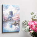 Framed canvas print of a traditional pagoda with cherry blossoms over tranquil waters, with modern skyline in the background