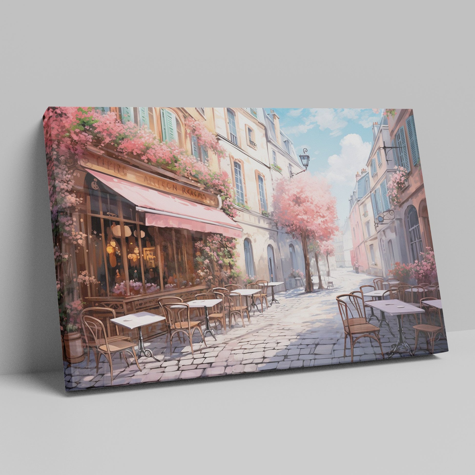 Framed canvas print of a picturesque Parisian alley with cherry blossoms and a street cafe scene in springtime