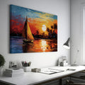 Framed canvas print of an Impressionist sailboat sailing at sunset with vibrant orange and blue colors