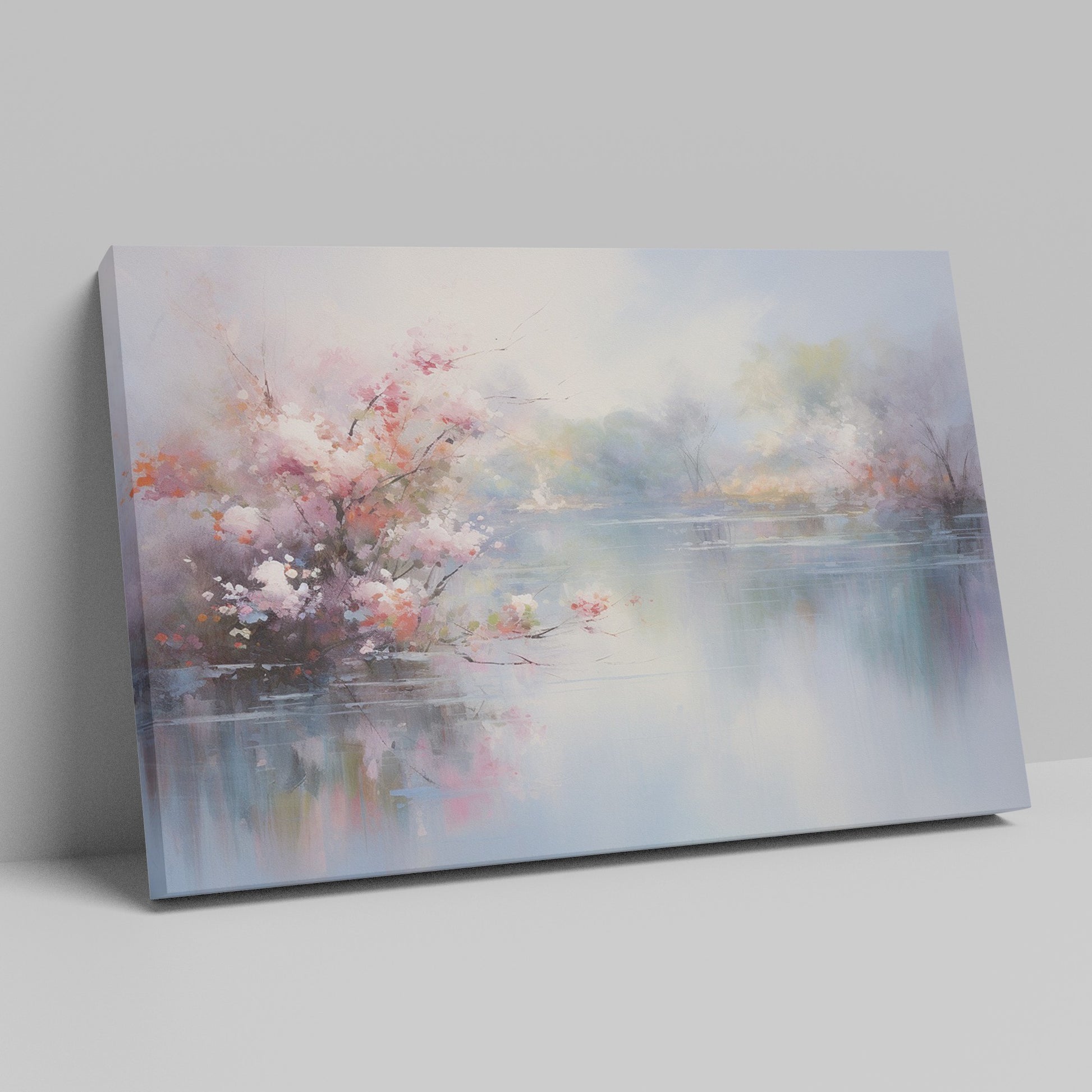 Framed canvas print depicting impressionist art of blossoming trees by a misty lake with soft pastel colours