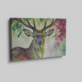 Framed canvas print of a vibrant stag with colourful floral surroundings