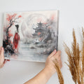 Framed canvas print of an Oriental landscape with a lady in red, cherry blossoms, and a traditional pagoda