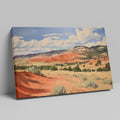 Framed canvas print of impressionistic desert hills with vivid red, earthy beige, and lush green tones