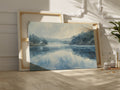 Framed canvas print of a serene lakeside watercolor painting with soft blue and grey tones