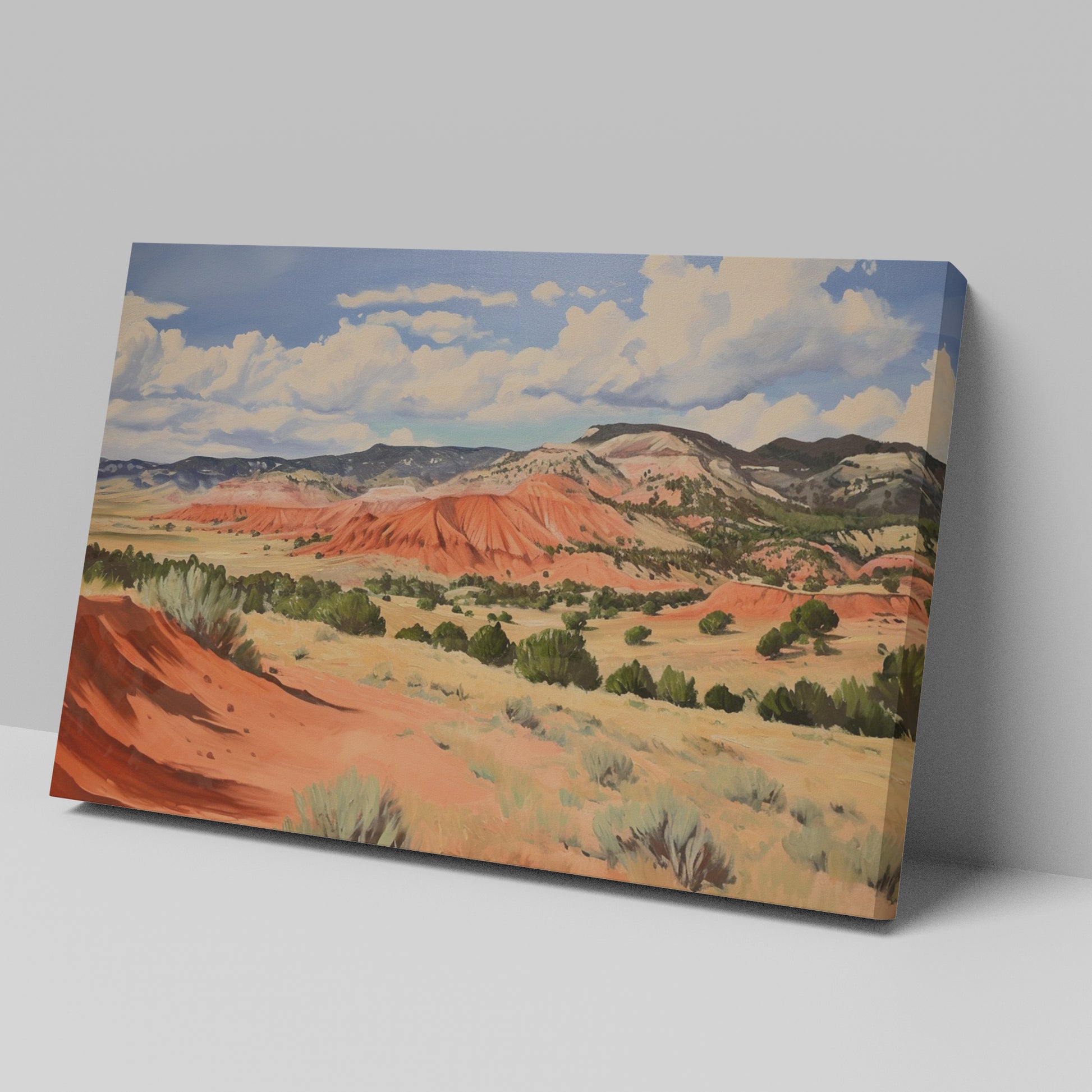 Framed canvas print of impressionistic desert hills with vivid red, earthy beige, and lush green tones