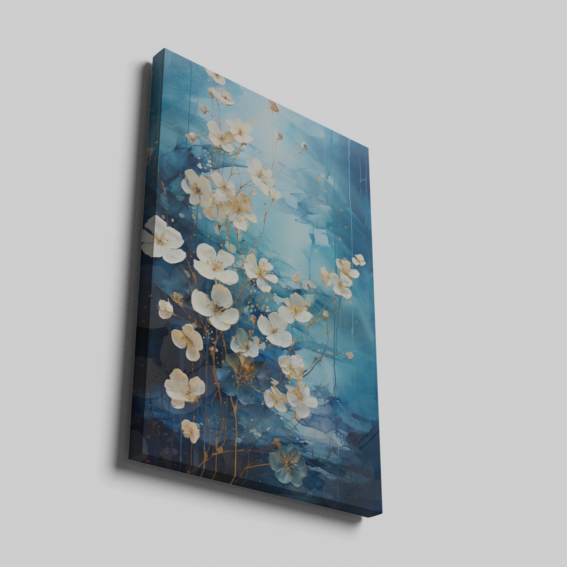 Framed canvas print of abstract blue and gold blossoms over a textured background